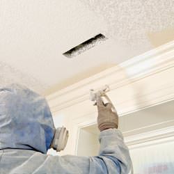 painting crown molding on the interior of a Orange house